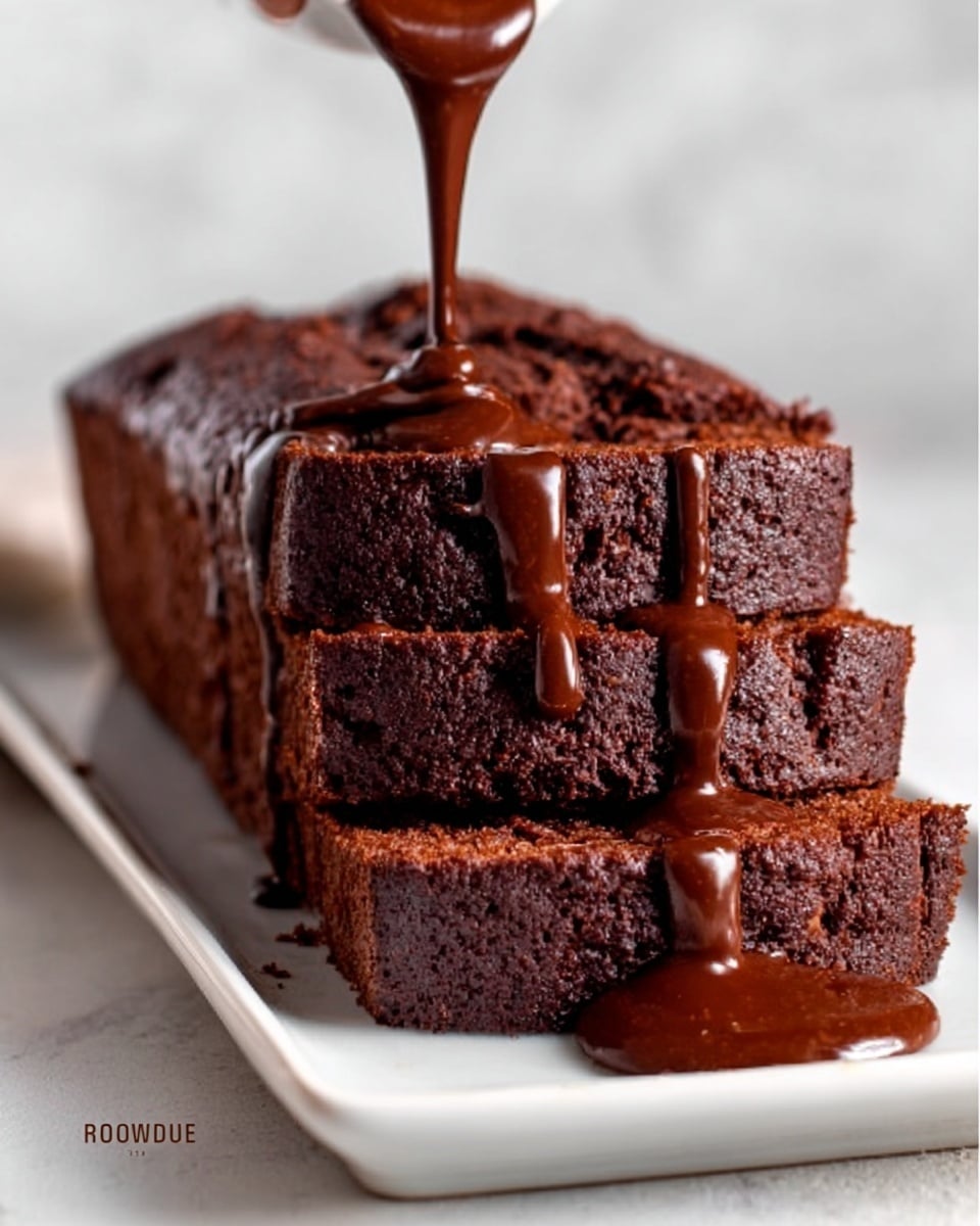 A close-up of a chocolate loaf cake sliced into four thick pieces stacked slightly over each other on a white rectangular plate, with a smooth, shiny chocolate sauce generously dripping over the top and sides, showing a rich, moist, dark brown texture inside the cake. A woman's hand is pouring more chocolate sauce from above, adding a glossy finish. The background is a white marbled texture. photo taken with an iphone --ar 4:5 --v 7