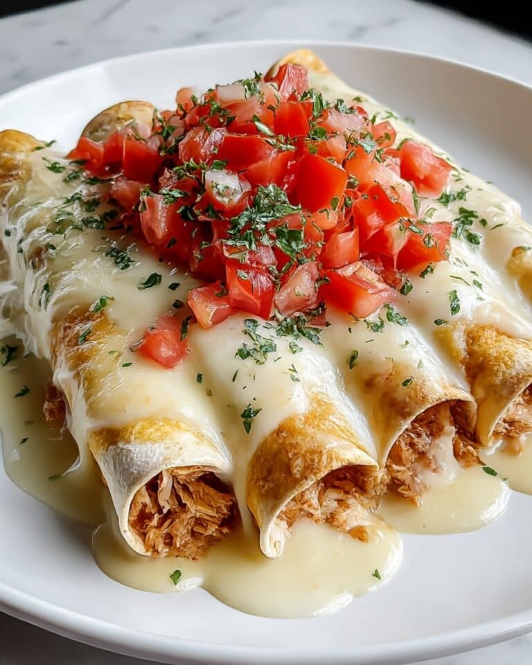 Indulgent Queso Chicken Enchiladas for Quick Weeknight Dinners Recipe
